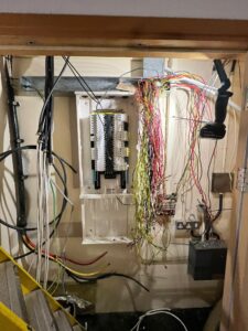 Specialist electrical installation of dedicated circuits for eight medical vaccine fridges in a hospital immunisation room.